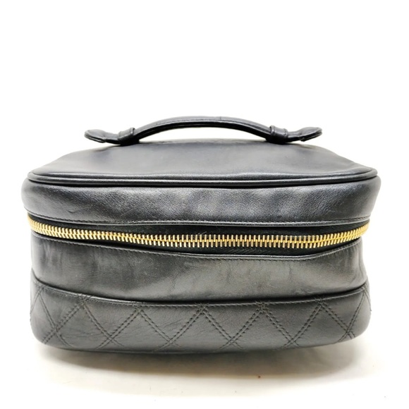 CHANEL Handbags - Chanel Black Lamb Skin Vanity